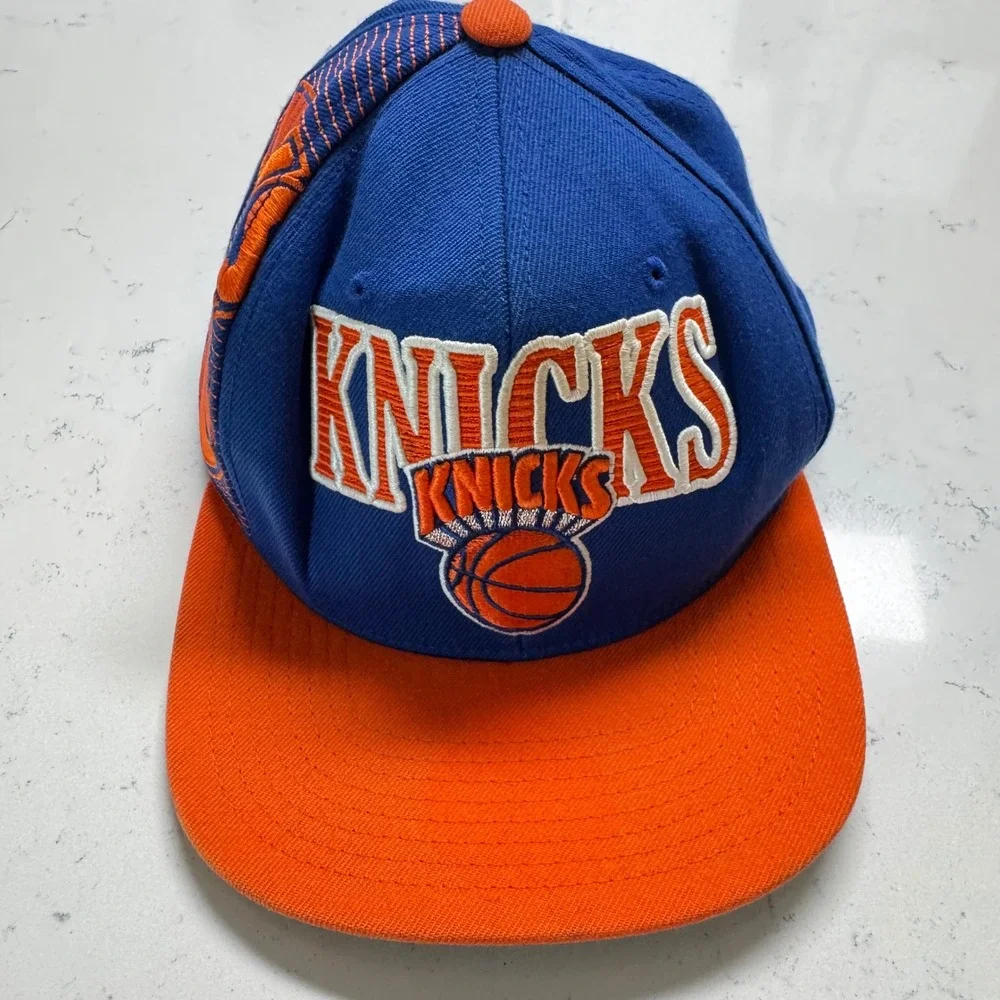 Mitchell & Ness New York Knicks Hat Mens OSFM Blue Orange NBA Snapback Cap